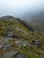 Cader Idris mountain with lake near the town of Dolgellau, in National Park Snowdonia in Wales, misty morning 2022