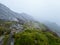 Cader Idris mountain with lake near the town of Dolgellau, in National Park Snowdonia in Wales, misty morning 2022