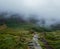 Cader Idris mountain with lake near the town of Dolgellau, in National Park Snowdonia in Wales, misty morning 2022