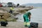 Cadiz, Spain, September 2, 2022. Crude oil spill in Gibraltar and the Andalusian coast. Cleaning beach sand and rocks