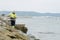 Cadiz, Spain, September 2, 2022. Crude oil spill in Gibraltar and the Andalusian coast. Cleaning rocks with pressurized water