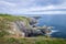 Caerfai Beach footpath area seascape view on a cloudy day West Wales UK