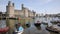 Caernarfon North Wales UK in summer with boats pan