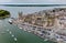 CAERNARFON, UK - AUGUST 31 2022: Aerial view of the ancient Caernarfon Castle in North Wales.  The castle is currently undergoing