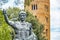 Caesar Augustus statue overlooking bell tower