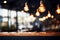 Cafe ambiance with blurred background and hanging light bulbs