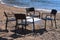 Cafe on the beach: wicker table and chairs by the sea.