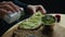 Cafe customer garnish avocado toast for breakfast