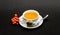 Cafe restaurant menu. Health care folk remedies. Drink aromatic beverage. Cup of tea on black background close up