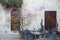 Cafe Table and Chair in Square on Street in Tuscany