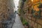 Cafe tables and chairs outside in old cozy street in Split, Croatia