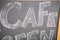 Cafe title written with chalk on blackboard