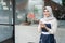 Cafe veiled waitress standing with hold a pen and note