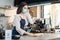 Cafe waiter wear mask, clean restaurant with sanitizer to open store. Asian attractive young couple disinfecting, wiping and