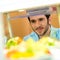 Cafeteria food display young man choose salad