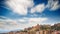 Cagliari city skyline in a long exposure on sunny windy day.