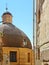 Cagliari colorful corner with church dome and city lamp in bright summer day, Sardinia Italy