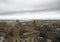 Cagliari's skyline with buildings, port, sea and gloomy grey clo