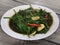 Cah kangkung, kangkong, or water spinach stirred
