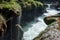 Cahabon river going underground and the small waterfalls falling off the limestone bridges in Semuc Champey, Guatemala