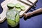 Caipirinha, lemon-based drink, sugar and typically Brazilian cachaÃ§a on wooden table.