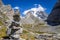 Cairn in front of the Cow lake, Lac des Vaches, in Vanoise national Park, France