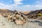 Cairn, human-made pile or stack of stones, marking mountain top in Hatta, Hajar Mountains, UAE