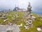 cairn (Inukshuk rocks) at the top of La Rhune mountain in the Atlantic Pyrenees. Border between Spain and France