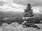 cairn (Inukshuk rocks) at the top of La Rhune mountain in the Atlantic Pyrenees. Border between Spain and France