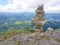 cairn (Inukshuk rocks) at the top of La Rhune mountain in the Atlantic Pyrenees. Border between Spain and France