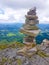 cairn (Inukshuk rocks) at the top of La Rhune mountain in the Atlantic Pyrenees. Border between Spain and France