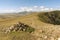 Cairn next to a stoney footpath in the Lake District, UK