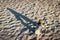 Cairn rock pile, long shadow