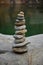 cairn stack of stones in front of water