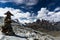 Cairn on the summit of a high peak in the Cordillera Blanca in Peru with a great view