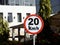 Cairo, Egypt, December 10 2022: A road sign of 20 KMH twenty Kilometers per hour speed limit in the slow lane near gateway,