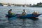 Cairo, Egypt February 18, 2017: Two Arab fishermen in a small boat typical of the Nile River, one paddling and the other crouching