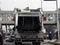 Cairo, Egypt, March 22 2023: a garbage large mobile car vehicle collecting garbage for trash removal from dustbins for