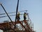 Cairo, Egypt, May 10 2023: engineers and workers at a construction site with scaffolds and mobile cranes in one of the new