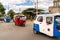 Cajamarca, Peru - September, 2018: Typical transportation called motorcycle taxis cross a street in Peru. Tuk tuks are uk tuks are