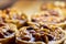 Cake basket with nuts filled with caramel and condensed milk. Background close up