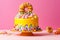 Cake on birthday with multicolored rainbow cream on a yellow background