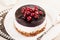 Cake with cranberry jelly cream round shape berries closeup
