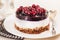 Cake with cranberry jelly cream round shape berries closeup