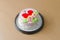 Cake flower and heart topping bakery