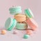 Cake macaron or macaroon stack on pink background, colorful mint and pink almond cookies, pastel colors