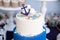 Cake with maritime decor. Blue and white cake.