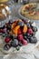 Cake meringues with fruits and berries. Currants, cherries, raspberries and apricots