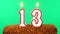 Cake with the number 13 lighted candle. Chroma key. Green Screen. Isolated