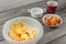 Cake preparation - plastic bowl with flour and yolk, egg shells